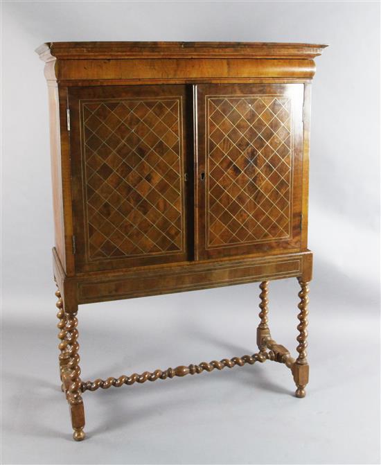 A William and Mary walnut cabinet on stand, W.3ft 6in. D.1ft 7in. H.4ft 11in.